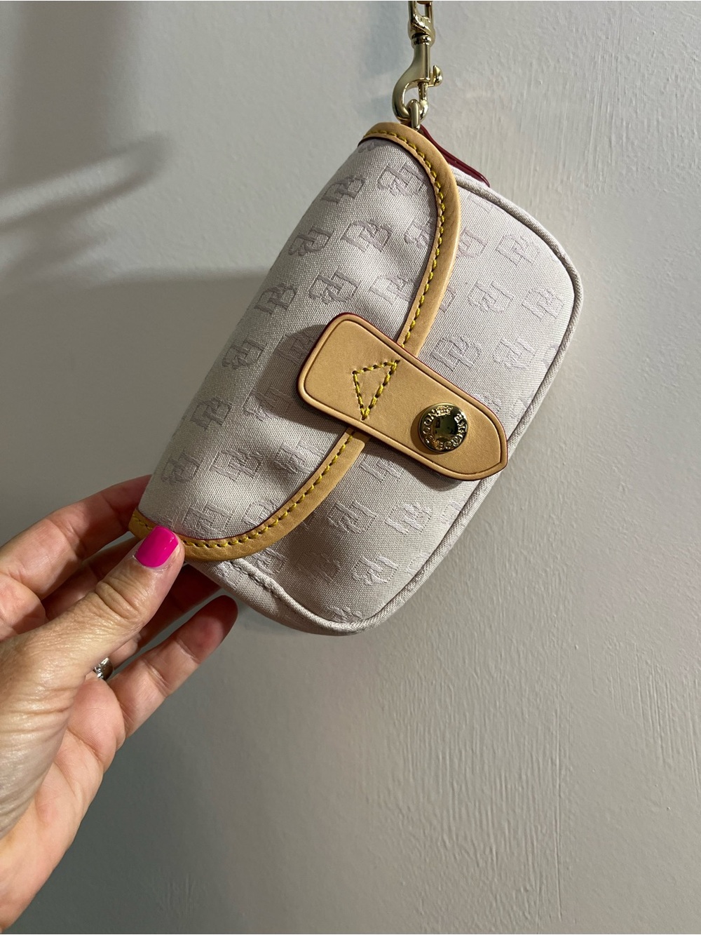 Dooney & Bourke Cream Wristlet Clutch with Tan Trim